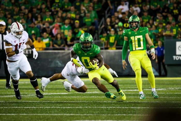 Oregon Ducks running back Mar'Keise 'Bucky' Irving runs the ball against the Stanford Cardinal.